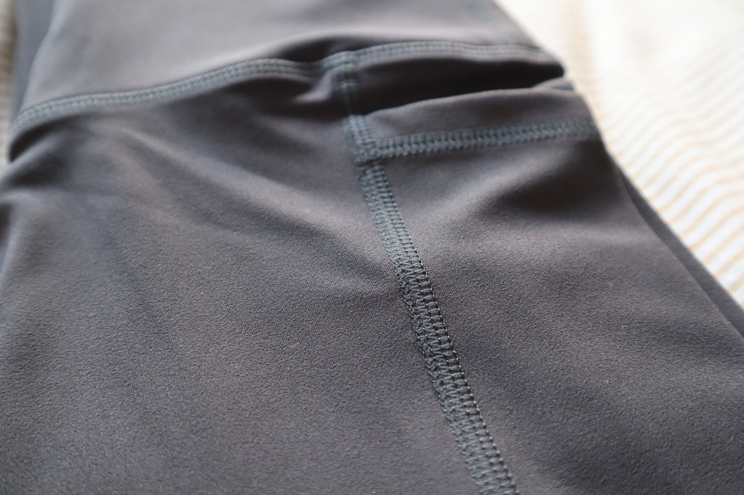 Close-up of a gray fabric with stitching detail